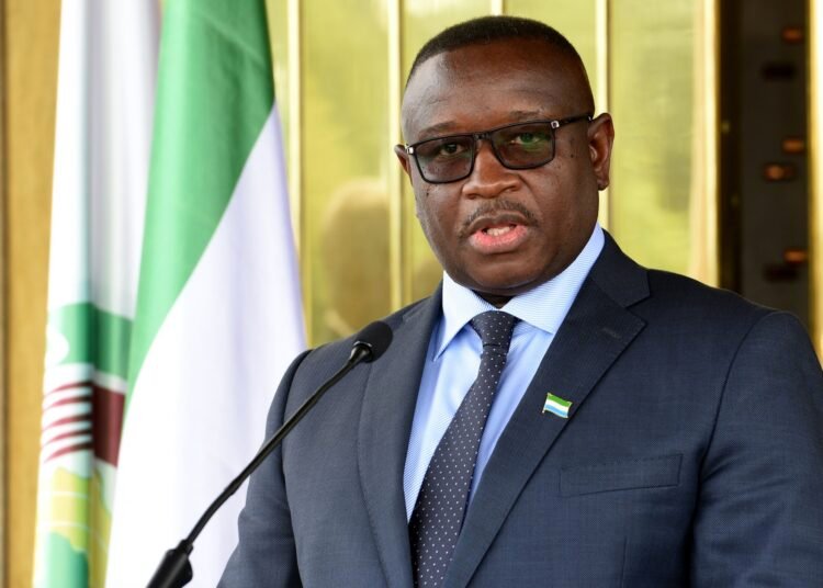 Sierra Leone President in blue suit encourages on good leadership by example, news image.